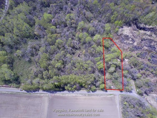 332-125_VerticalView showing farmland located in front of block.