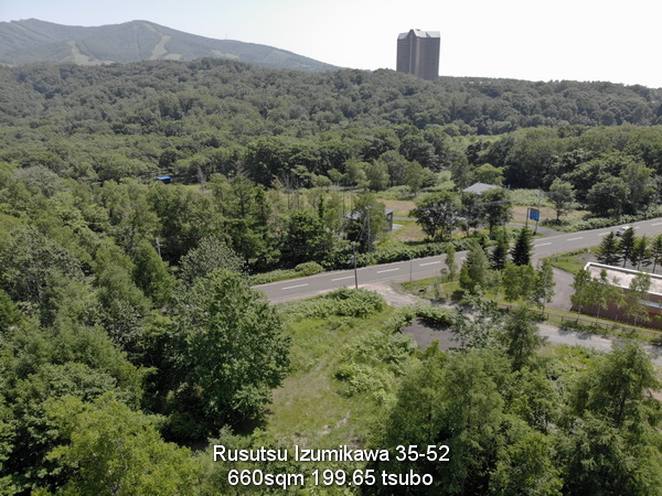 35-52 Izumikawa, Rusutsu on route 230 for sale. Rusutsu, Westin Hotel and Rusutsu Ski Resort East Mountain, in background. 